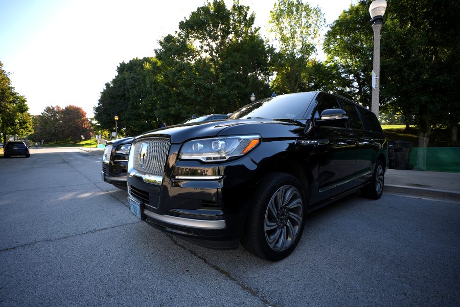 Luxury SUV — black luxury vehicle, front view